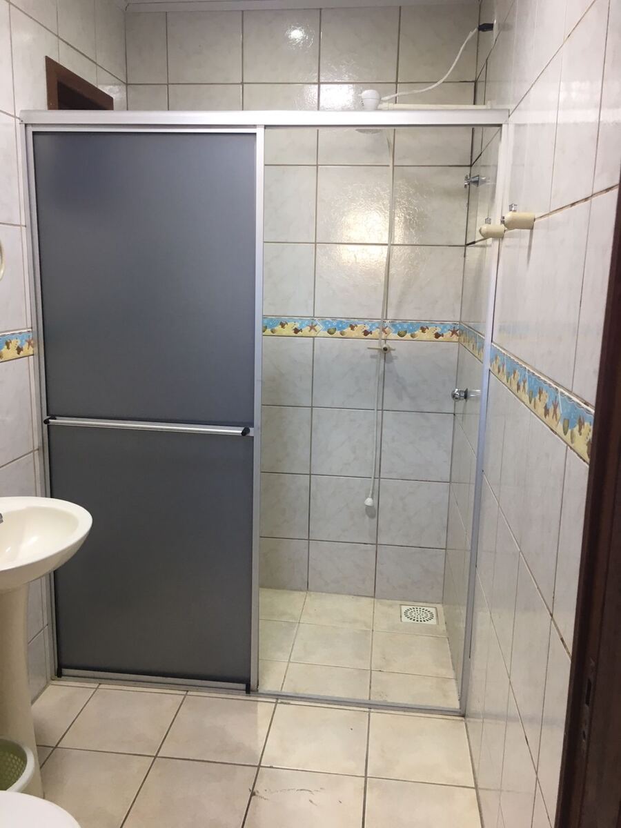 Banheiro privativo do Apartamento 1 no Camping Padang