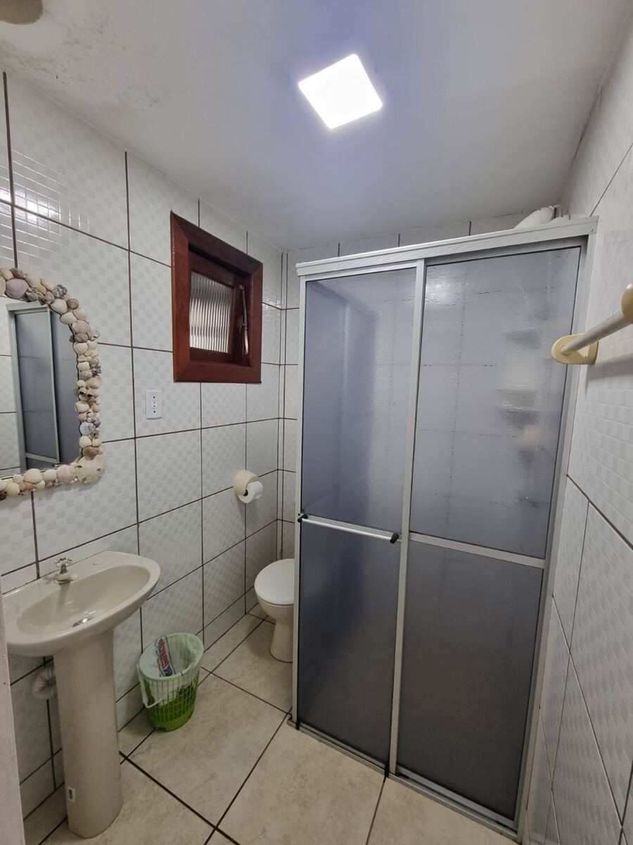 Banheiro privativo do Apartamento 7 no Camping Padang